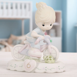 Precious Moments: Girl On Bicycle Age 6 Figurine, Blonde sparkle-castle