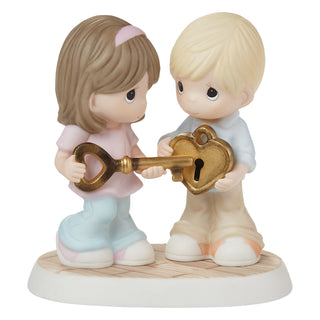 Precious Moments: Couple Holding Heart Lock Figurine sparkle-castle