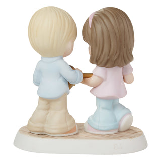 Precious Moments: Couple Holding Heart Lock Figurine sparkle-castle