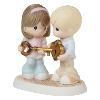 Precious Moments: Couple Holding Heart Lock Figurine sparkle-castle