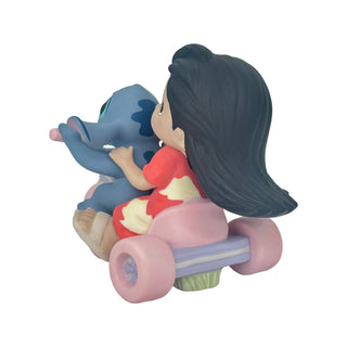 Precious Moments Disney Showcase: Lilo & Stitch Riding Big Wheel Figurine sparkle-castle