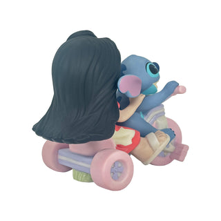 Precious Moments Disney Showcase: Lilo & Stitch Riding Big Wheel Figurine sparkle-castle