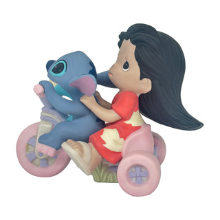 Precious Moments Disney Showcase: Lilo & Stitch Riding Big Wheel Figurine sparkle-castle