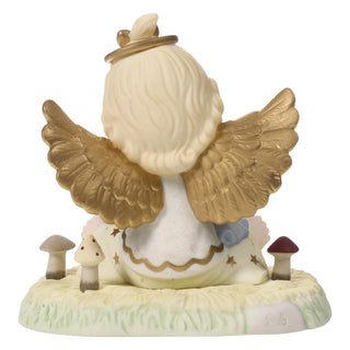 Precious Moments: Angel Holding Baby Jesus Figurine sparkle-castle
