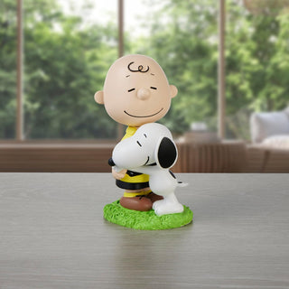 Precious Moments Peanuts: Snoopy Hugging Charlie Brown Figurine