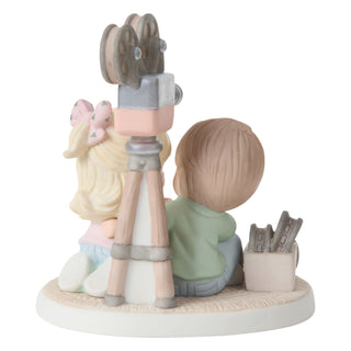 Precious Moments: Couple Watching Home Movies Figurine sparkle-castle