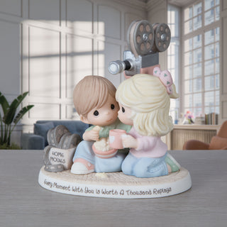 Precious Moments: Couple Watching Home Movies Figurine sparkle-castle