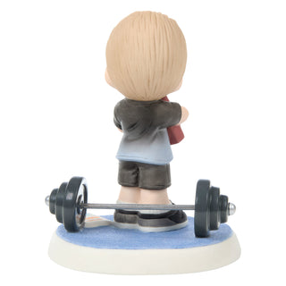 Precious Moments: Boy with Bible And Weights Figurine sparkle-castle