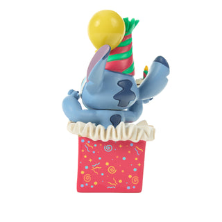 Precious Moments Disney: Stitch in Birthday Present Figurine sparkle-castle