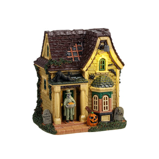 Lemax Spooky Town Halloween Village: Gentleman Ghouls Treats sparkle-castle