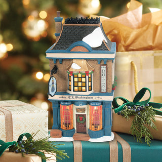Department 56 Dickens Snow Village: T.L. Buckingham Doll Shop sparkle-castle