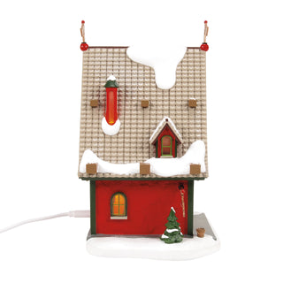 Department 56 North Pole Series: 50th Reindeer Acres Stable sparkle-castle