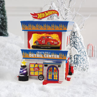 Department 56 North Pole Series: Hot Wheels Detail Center, Set of 2 sparkle-castle