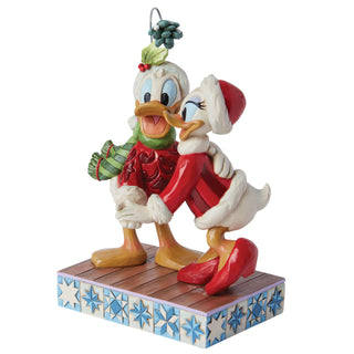 Jim Shore Disney Traditions: Donald & Daisy Under Mistletoe Figurine sparkle-castle