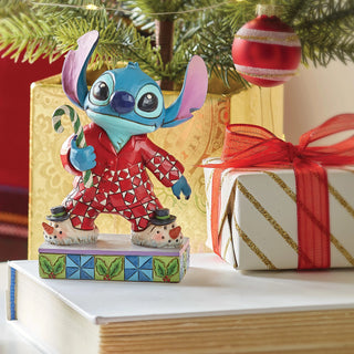 Jim Shore Disney Traditions: Stitch In Christmas PJ's Personality Pose Figurine sparkle-castle