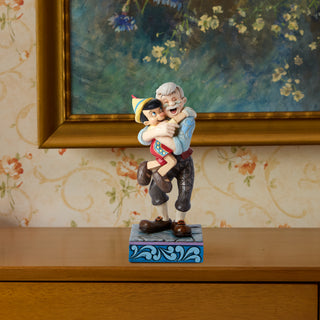Jim Shore Disney Traditions: Gepetto & Pinocchio Figurine sparkle-castle