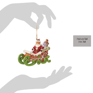 Jim Shore Heartwood Creek: Gingerbread Christmas Santa in Sleigh Hanging Ornament sparkle-castle