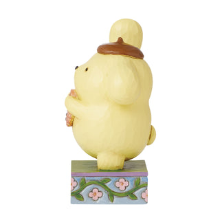 Jim Shore Sanrio: Pompompurin With Cookie Figurine sparkle-castle