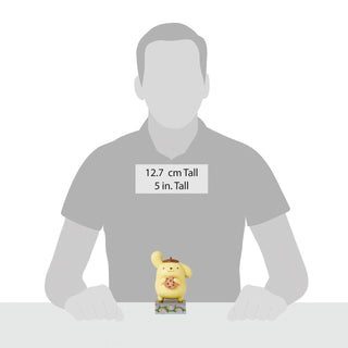 Jim Shore Sanrio: Pompompurin With Cookie Figurine sparkle-castle