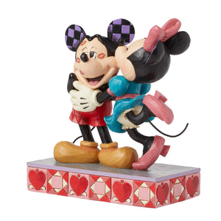 Jim Shore Disney Traditions: Minnie Kissing Mickey Figurine sparkle-castle