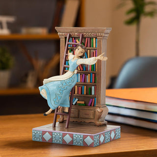 Jim Shore Disney Traditions: Belle with Bookshelf Figurine sparkle-castle