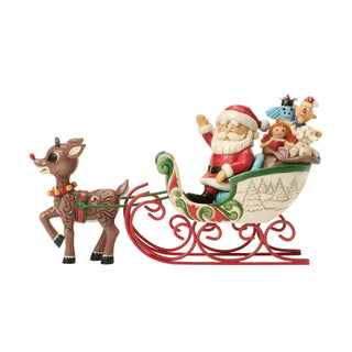 Jim Shore Rudolph Traditions: Rudolph Pulling Santa's Sleigh Figurine sparkle-castle