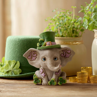 Jim Shore Heartwood Creek: Elephant With Leprechaun Hat Figurine sparkle-castle
