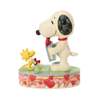 Jim Shore Peanuts: Snoopy & Woodstock Exchanging Gifts Figurine sparkle-castle