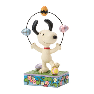 Jim Shore Peanuts: Snoopy Juggling Easter Eggs Figurine sparkle-castle