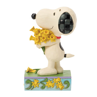 Jim Shore Peanuts: Snoopy With Bouquet of Daffodils Figurine sparkle-castle