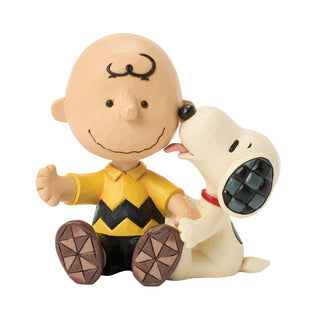 Jim Shore Peanuts: Snoopy Licking Charlie Brown's Cheek Figurine sparkle-castle