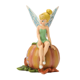 Jim Shore Disney Traditions: Tinker Bell Sitting on Pumpkin Figurine sparkle-castle