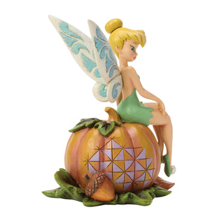 Jim Shore Disney Traditions: Tinker Bell Sitting on Pumpkin Figurine sparkle-castle