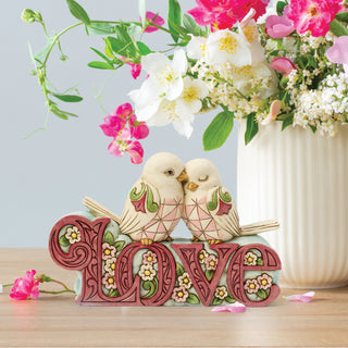 Jim Shore Heartwood Creek: Birds Perched On A LOVE Word Sign Figurine sparkle-castle