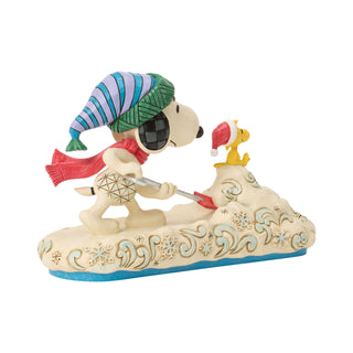 Jim Shore Peanuts: Snoopy Shoveling Snow Figurine sparkle-castle