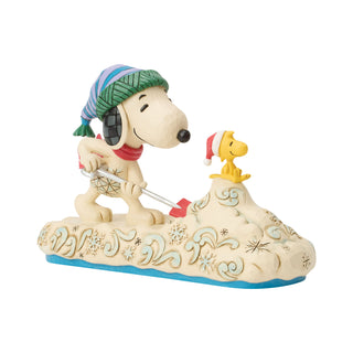 Jim Shore Peanuts: Snoopy Shoveling Snow Figurine sparkle-castle