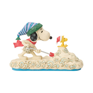 Jim Shore Peanuts: Snoopy Shoveling Snow Figurine sparkle-castle