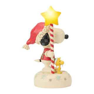 Jim Shore Peanuts: Snoopy With Light Up Star Staff Figurine sparkle-castle