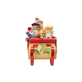 Jim Shore Peanuts: Snoopy and Friends in Sleigh Figurine sparkle-castle