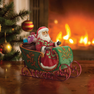 Jim Shore Heartwood Creek: Santa in Musical Sleigh Figurine sparkle-castle