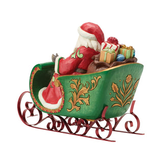 Jim Shore Heartwood Creek: Santa in Musical Sleigh Figurine sparkle-castle