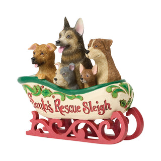Jim Shore Heartwood Creek: Santa's Rescue Sleigh Figurine sparkle-castle