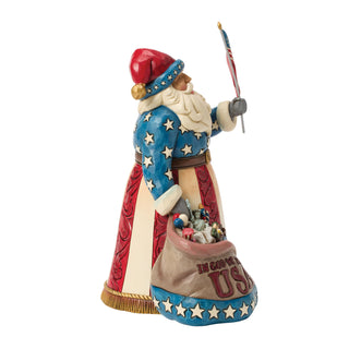 Jim Shore Heartwood Creek: Patriotic Santa With Bag of Americana Figurine sparkle-castle