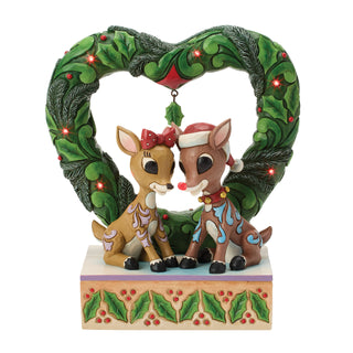 Jim Shore Rudolph Traditions: Rudolph & Clarice In Heart Wreath Figurine sparkle-castle