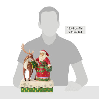 Jim Shore John Deere: Santa Petting Reindeer Wearing John Deere Blanket Figurine sparkle-castle