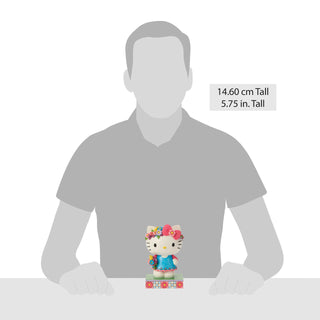 Jim Shore Sanrio: Hello Kitty with Flower Crown Figurine sparkle-castle