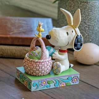 Jim Shore Peanuts: Snoopy with Basket of Easter Egg Figurine sparkle-castle
