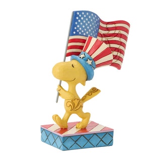 Jim Shore Peanuts: Patriotic Woodstock with Flag Figurine