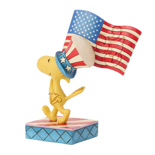 Jim Shore Peanuts: Patriotic Woodstock with Flag Figurine