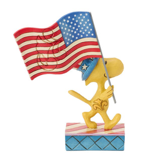 Jim Shore Peanuts: Patriotic Woodstock with Flag Figurine